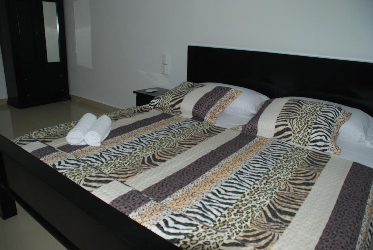 סן פדרו Hotel Coastalbay 2 & Golf Cart Rental מראה חיצוני תמונה